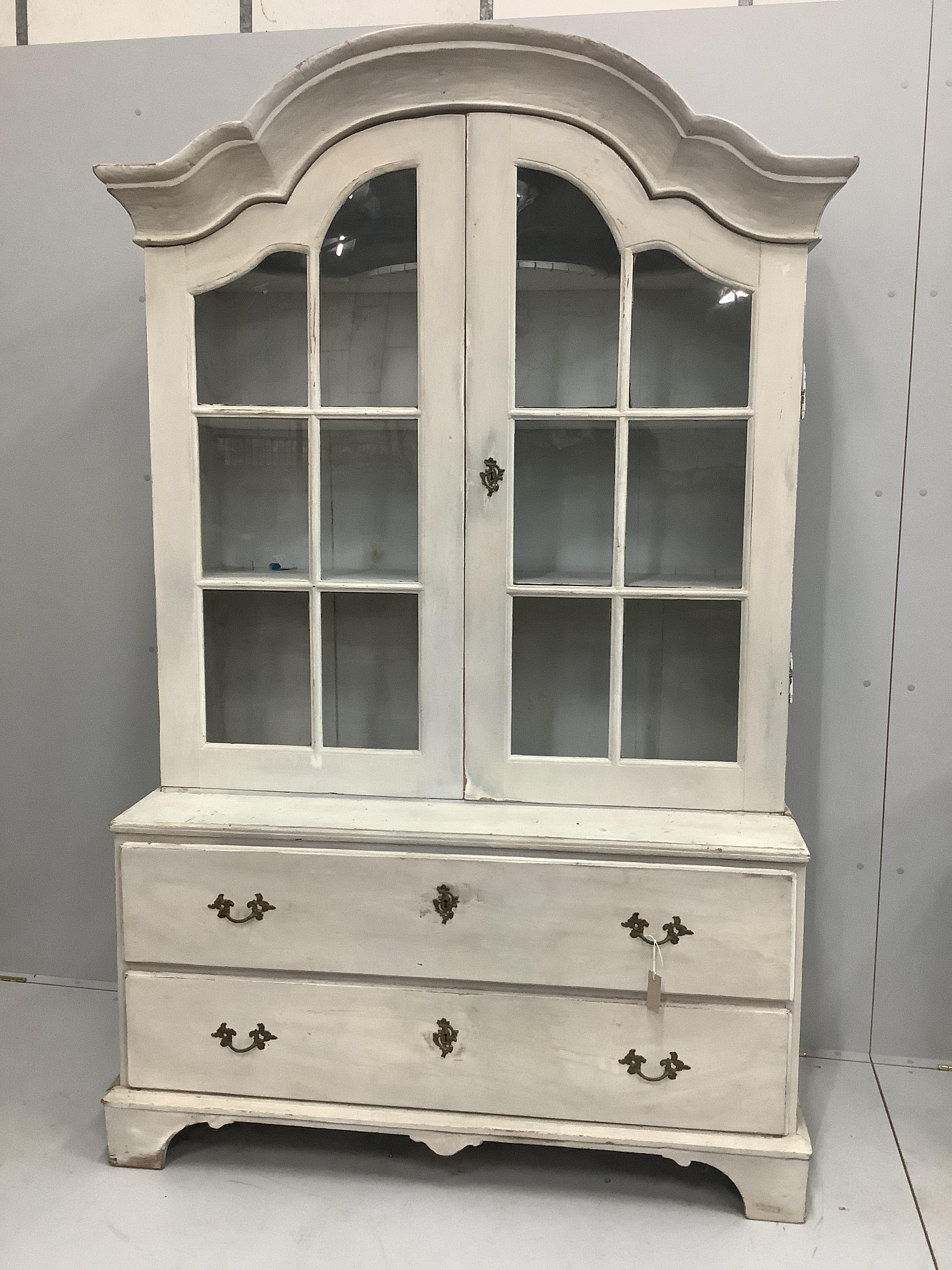 A Continental white painted beech dresser with two base drawers, circa 1900, width 135cm, height 218cm